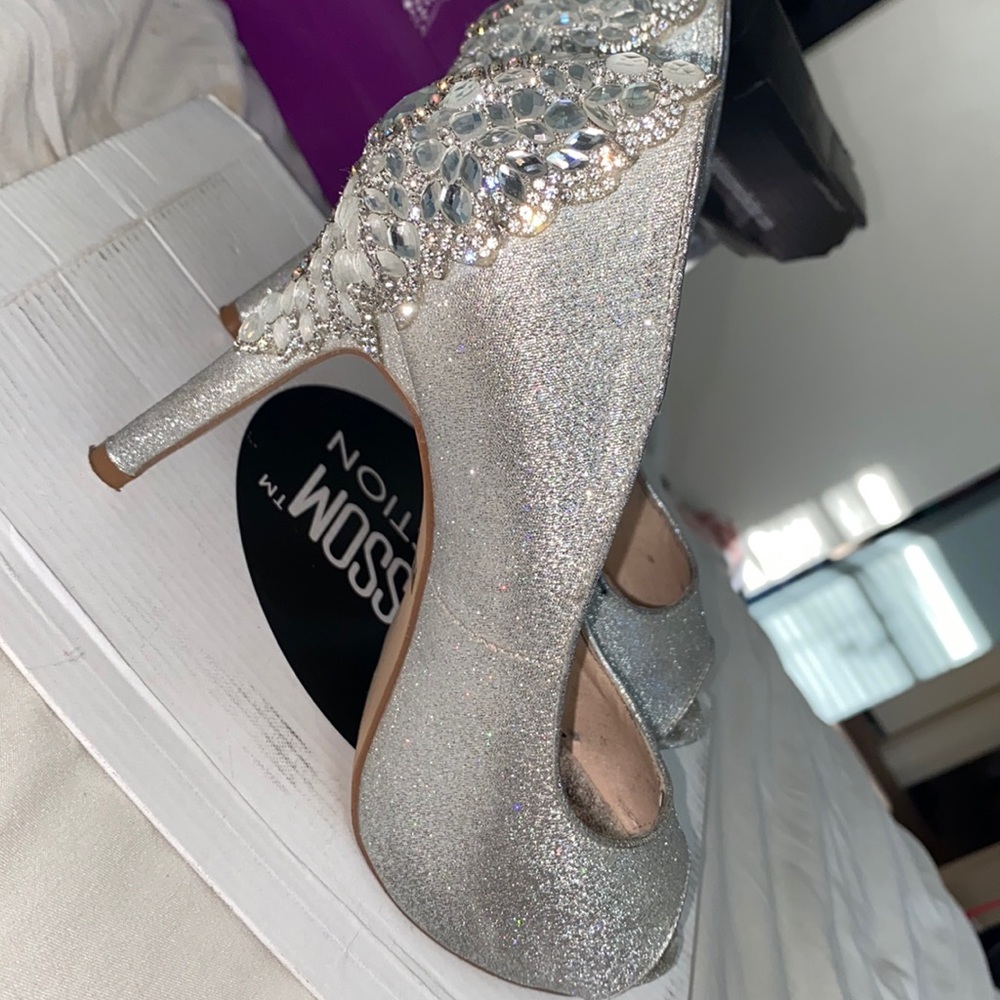 Gorgeous silver heels, they were worn once for a prom and that was all
